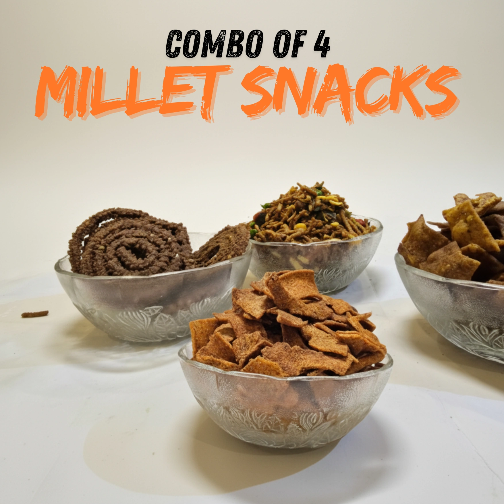 OGFlZTE0OWM1Nzk3NGZiNmIyMWRhODZlN2QzNTgyMTMuanBn (1755 x 1755 px) Combo Millet Snacks – Chips, Nimki, Mixture & Mudki (4×100g) - Image 1